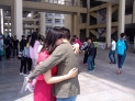 湖北网台讯（通讯员 江舟）2014年5月10日，在江汉大学运动训练专业招生文化考试现场外，一名考生在考务老师的倡议下热情地拥抱了考场外候考的母亲，向她表达“母亲节快乐”的问候。